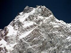 
Nanga Parbat Rupal Face Summit Area Close Up From Herligkoffer Rupal Face Base Camp. My first impression on emerging onto the ridge from the South Face was for me the most powerful moment of the entire Nanga Parbat Expedition. Everything seemed so unreal, so quiet. And there was Gunther, right next to me. (The Naked Mountain by Reinhold Messner).
